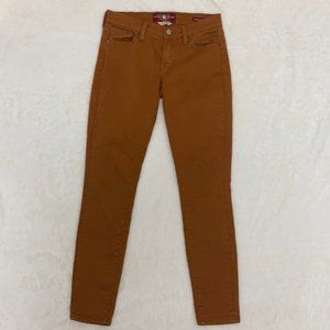 Broken-in pair of Lucky Brand Rusty Brown pair of Jeans.  Size 26.